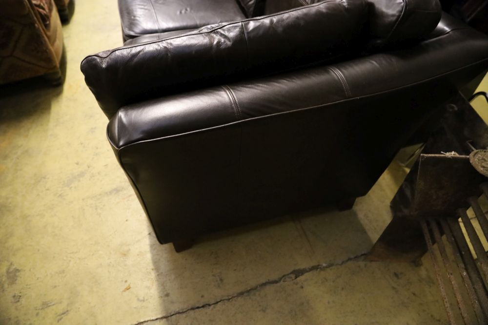 A modern brown leather two seat sofa, width 190cm depth 100cm